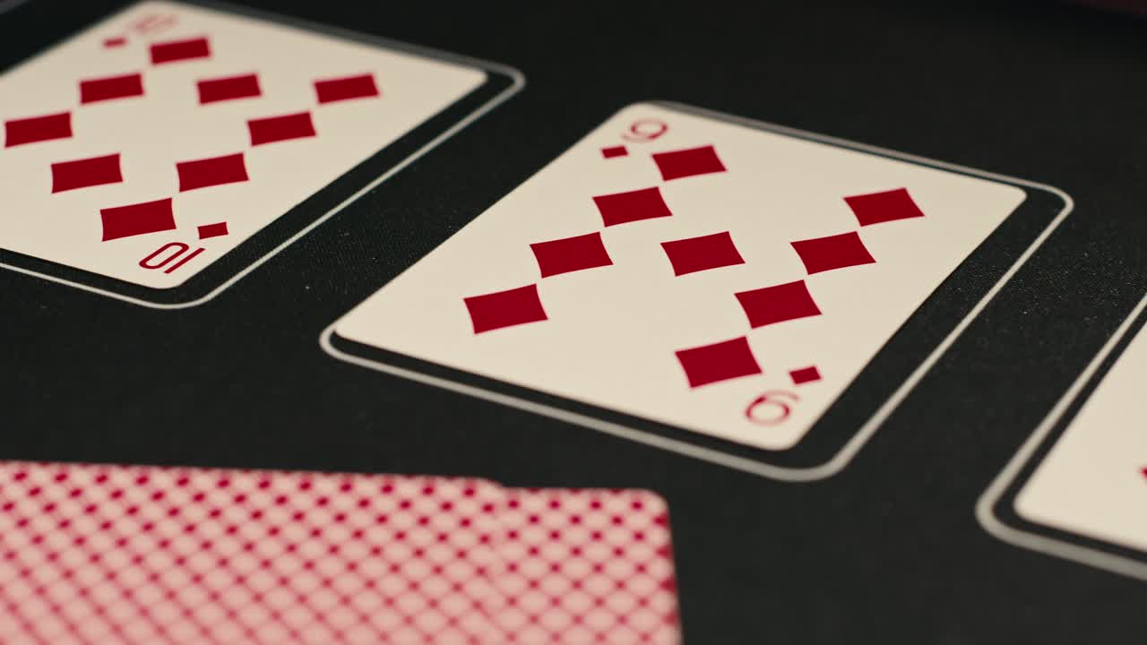 Hands managing poker chips on green table, reflecting intense poker gameplay with the element of chance and skill