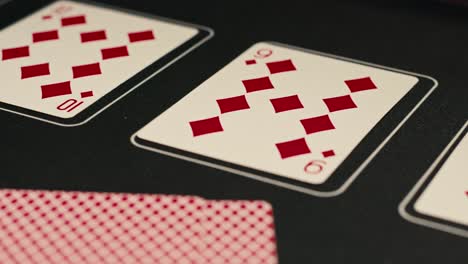 hands managing poker chips on green table, reflecting intense poker gameplay with the element of chance and skill