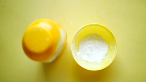 Top-view-of-baby-powder-on-white-background