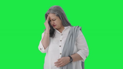 estresada y tensa mujer de negocios india de alto rango pantalla verde