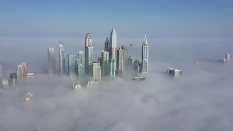 marina skyline in dubai under heavy fog