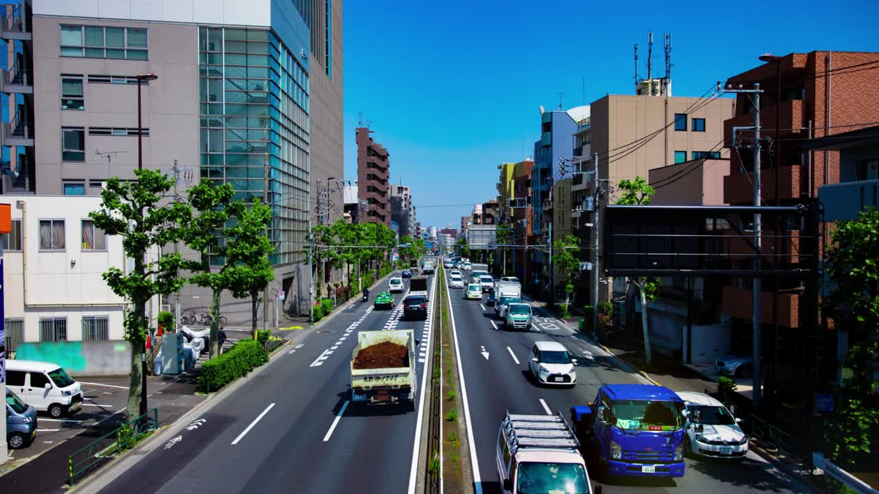 도쿄의 도시 거리에서 교통 체증의 타임 스 긴