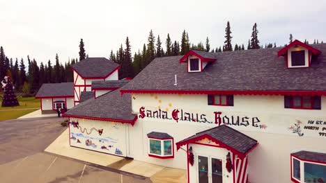 4k drone video of christmas tree at santa claus house in north pole, alaksa during summer day