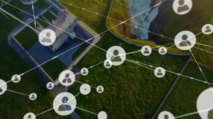 Icone utente e animazione di connessioni di rete su vista aerea di paesaggio costiero