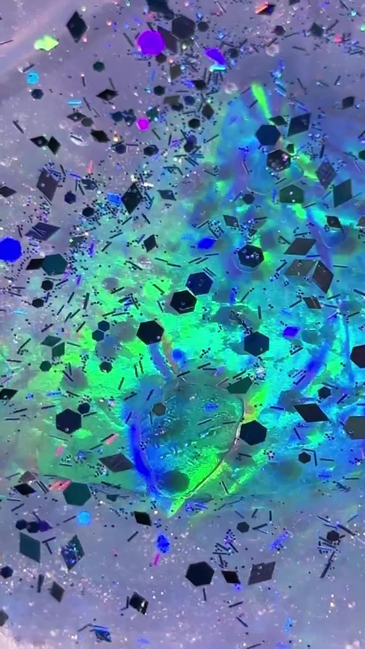 Sfondo glitterato con particelle iridescenti