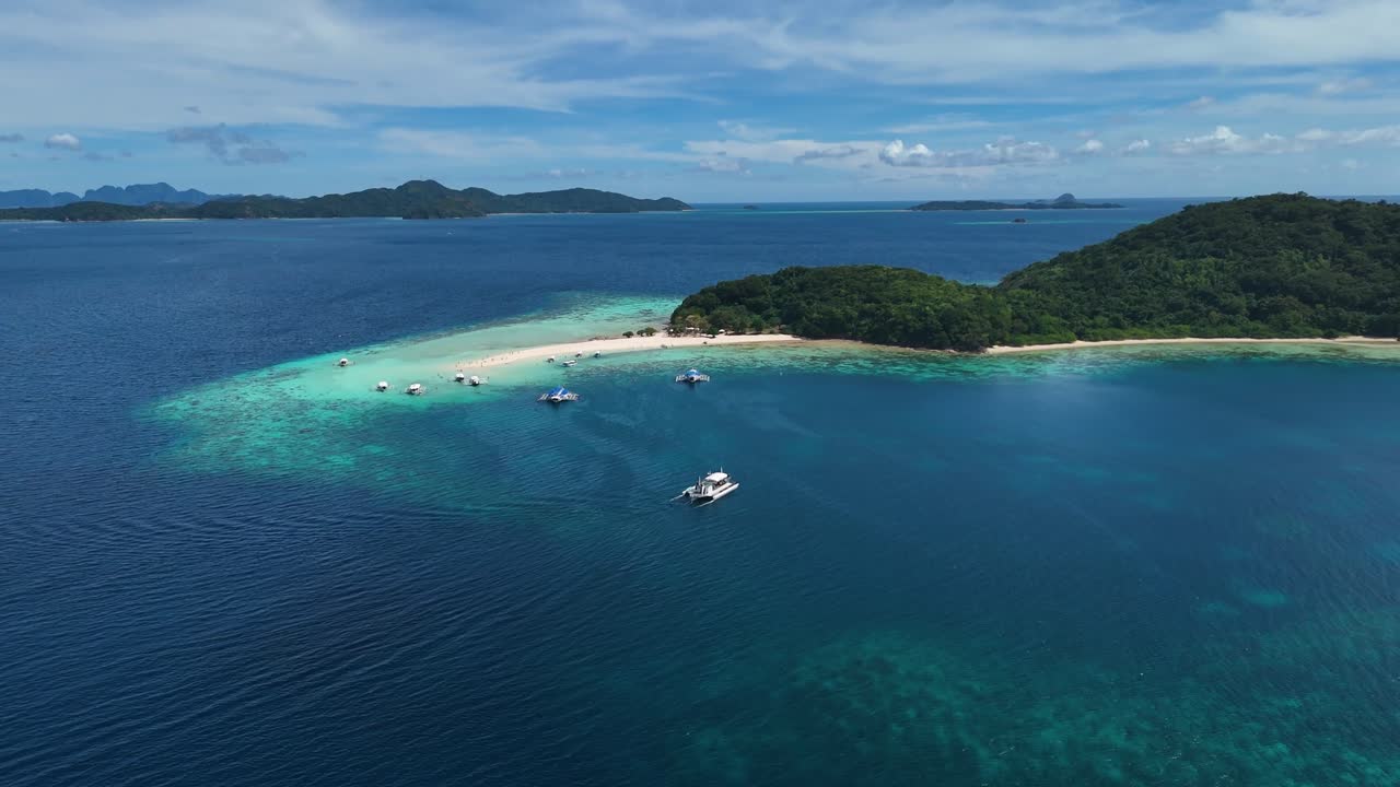 Tropical Island Paradise with Turquoise Water and Boats