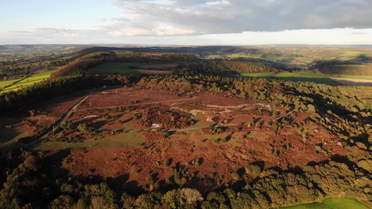 Stunning aerial footage of Firebeacon Hill Sidmouth England filmed at sunset showing the beautiful English Countryside