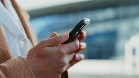 woman using smartphone outdoors