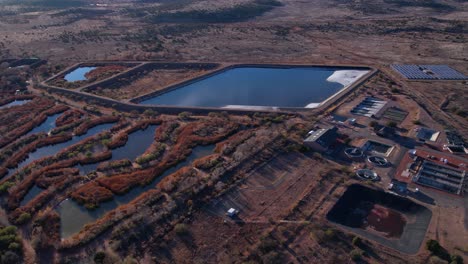 sedona wetlands preserve arizona usa, aerial view, wastewater treatment facility in desert landscape, drone shot