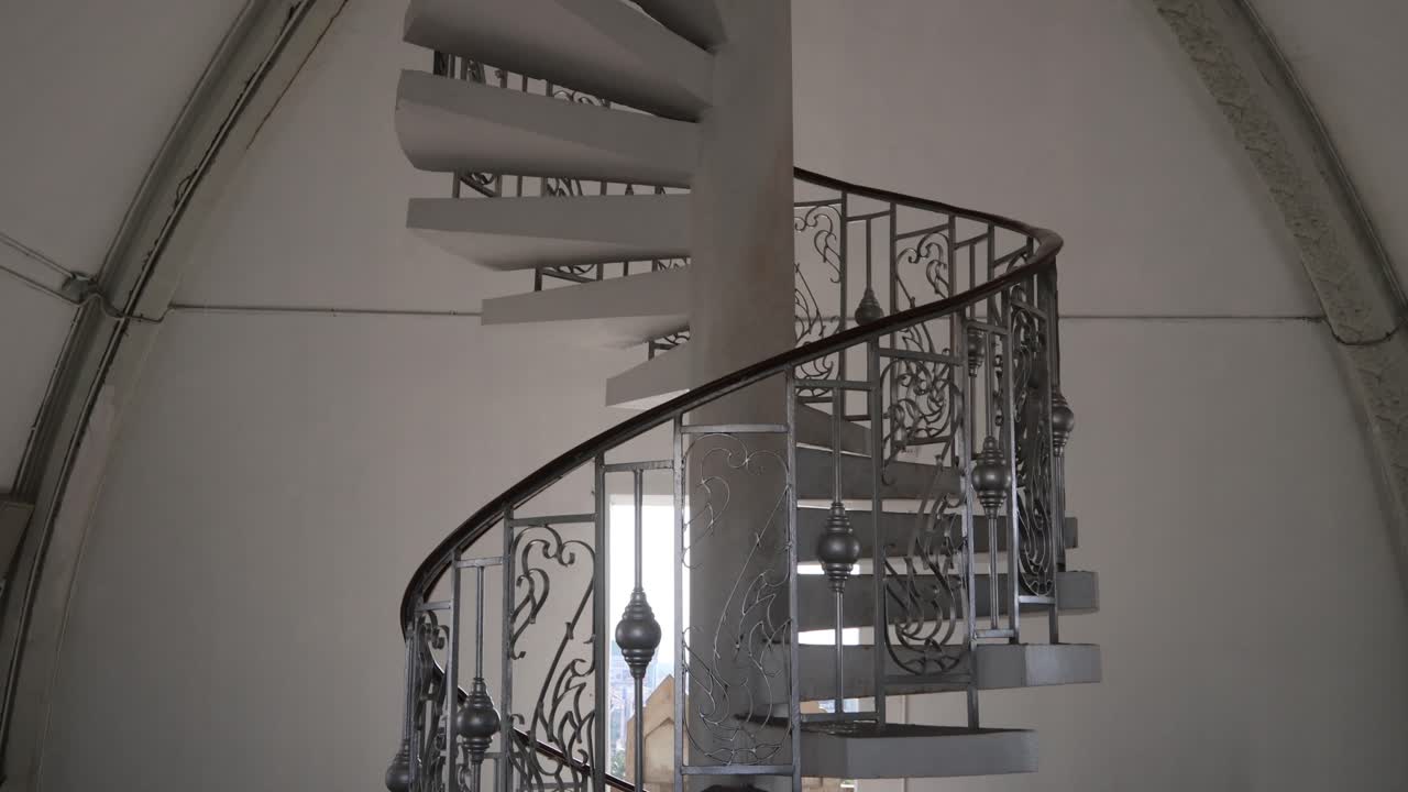 Spiral staircase taking you up to the top of Patuxai Victory Monument in the center of Vientiane, Laos