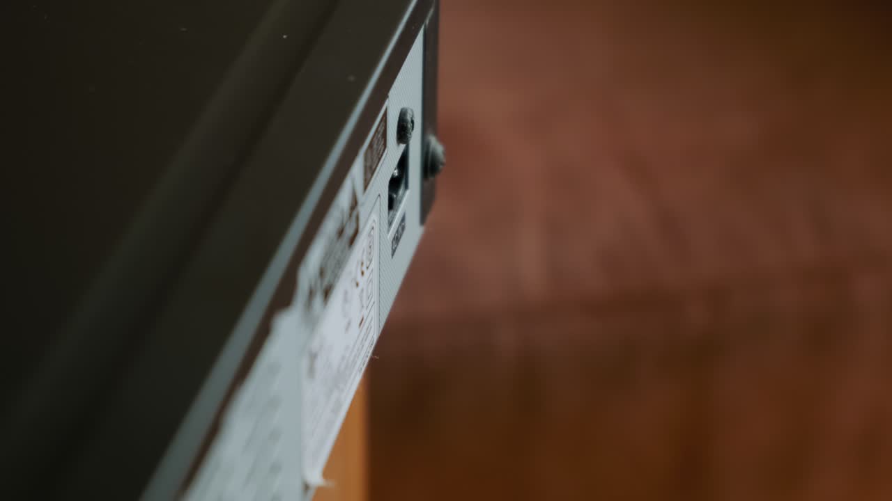 Insert the power cable into a device