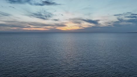 european sunset with wispy clouds in spain