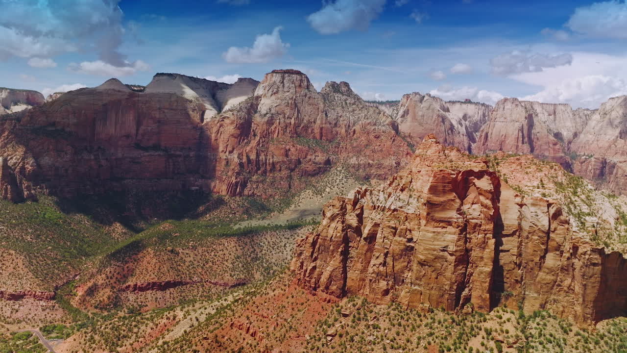 Fantastic mountains of canyons in Utah, USA. Shades of clouds falling on the rocks. Aerial view.