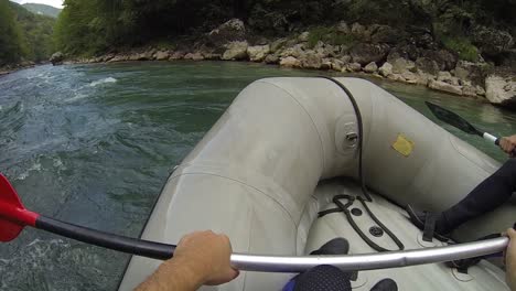 Kayaking-true-the-river-Tara-in-Bosnia-and-Herzegovina,-Driving-down-the-river,-having-fun-and-adventure-in-this-beautiful-country