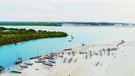 beautiful african harbor scenery with people and pirogues
