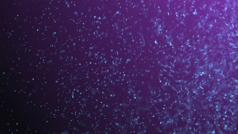 animación de partículas azules brillantes que caen contra un fondo púrpura con espacio de copia.