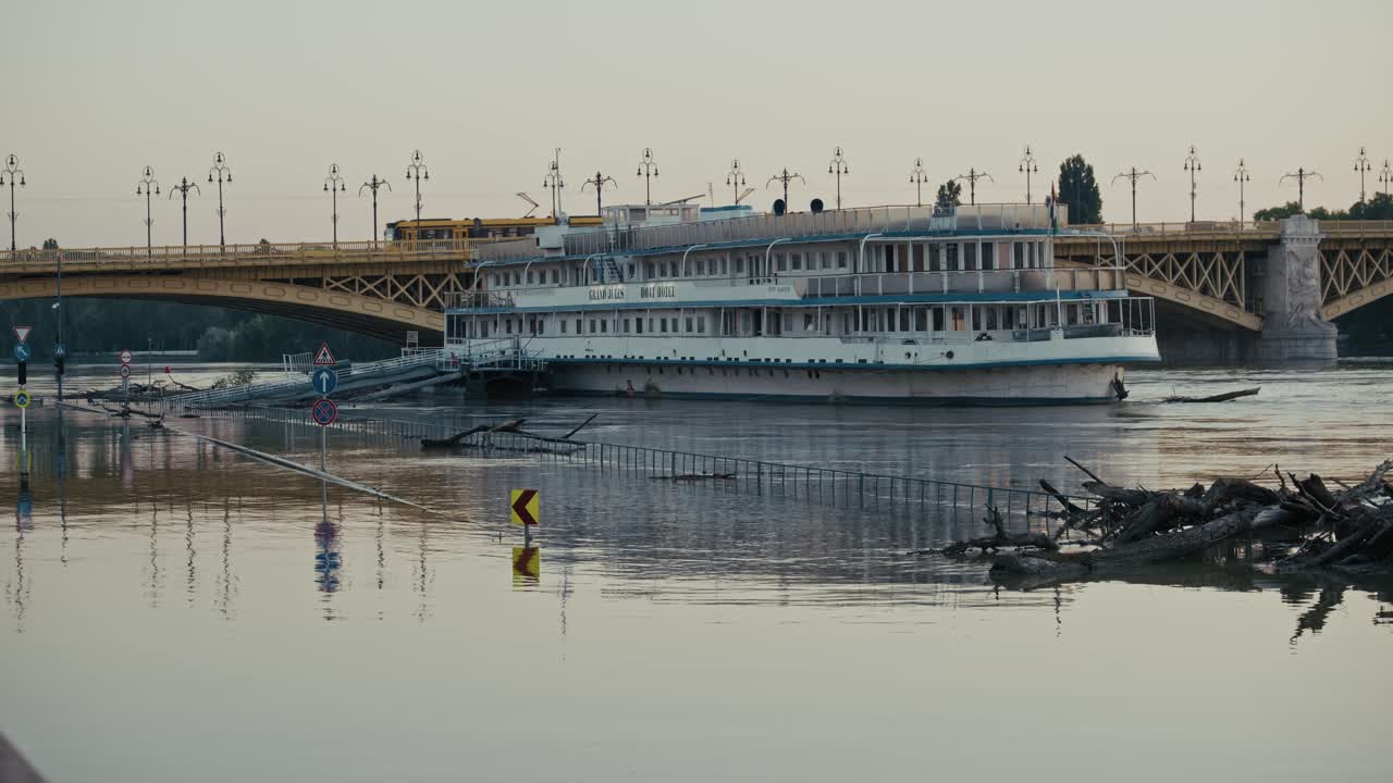 River Flood with Boat and Bridge