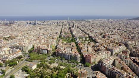 panoramic aerial view of barcelona cityscape towards the mediterranean sea