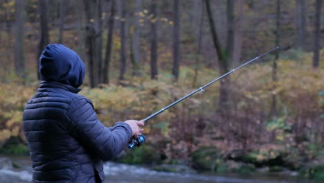 fishing in a mountain river in the middle of a forest fishing in a mountain river in the middle of a forest