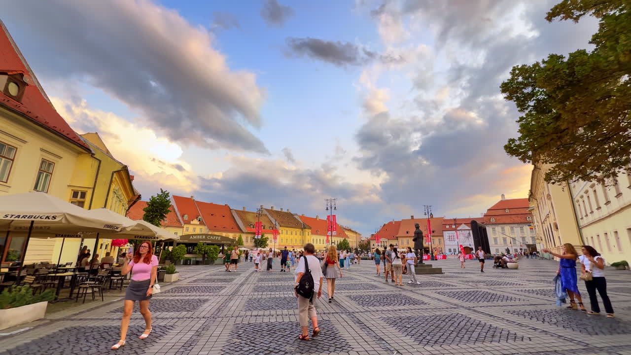 Sibiu, Romania, 1 July 2025: Colorful houses in Sibiu main square. Traditional colorful houses and cobblestone streets in the central square of Sibiu Romania