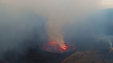 hot and red molten lava at volcano day to night time lapse