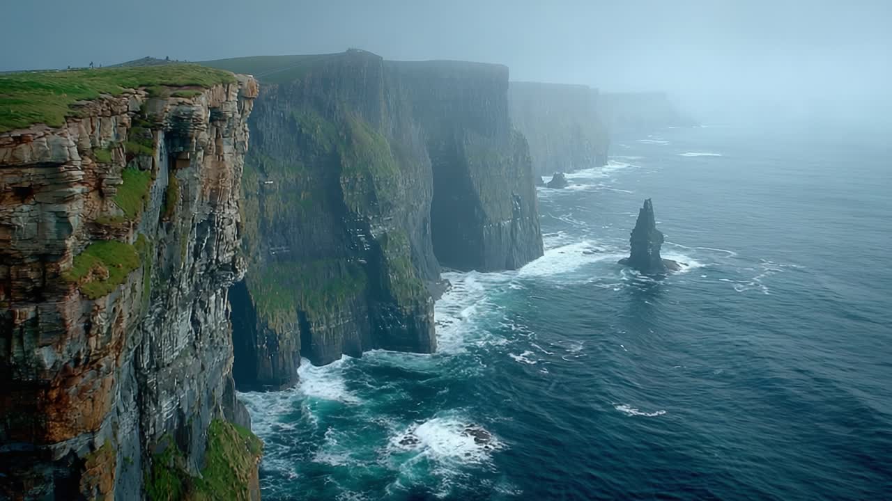 Breathtaking Coastal Cliffs Amidst Misty Waters: An Atmospheric Journey along the Rugged Shoreline Captured in Two Stunning Frames