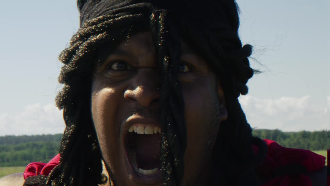 Samson producing an earth shaking roar towards screen, Biblical character with long dreads, Israelite warrior and judge, black male in old testament, Christian