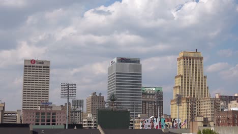 time lapse shot of clouds moving behind memphis downtown city skyline business district