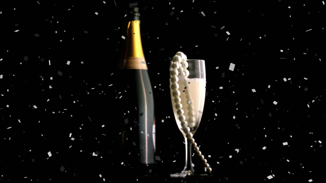Animation af konfetti falder og perlekæde i champagneglas