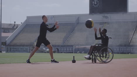 disabled athlete training with coach