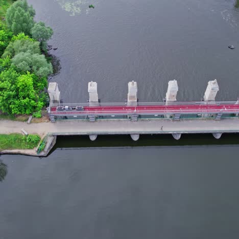 a dam on a small river. season of the summer