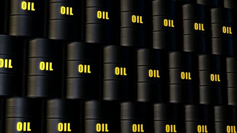 stacked black oil barrels. the word oil is painted in yellow.