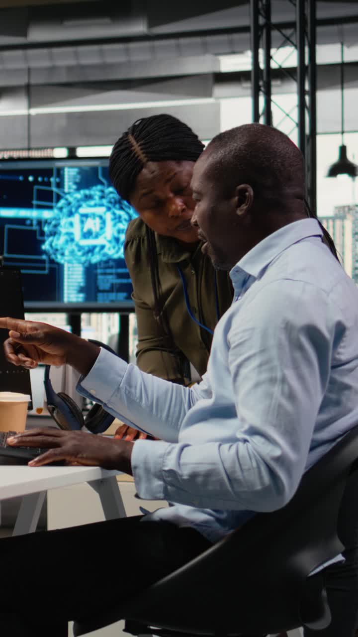 Vertical video Data scientists doing brainstorming in office, using AI specialized hardware