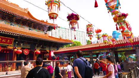 people exploring vibrant temple in hong kong