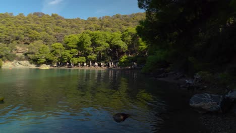 panorama of love's bay beach in poros island greece