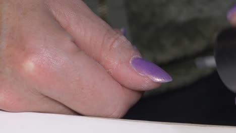 young-woman-paint-nail-with-acrylic