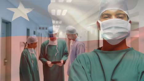 animation of flag of chile waving over surgeons in operating theatre