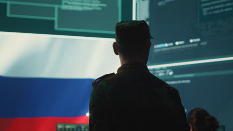 military hacker from russian army working in governmental control room