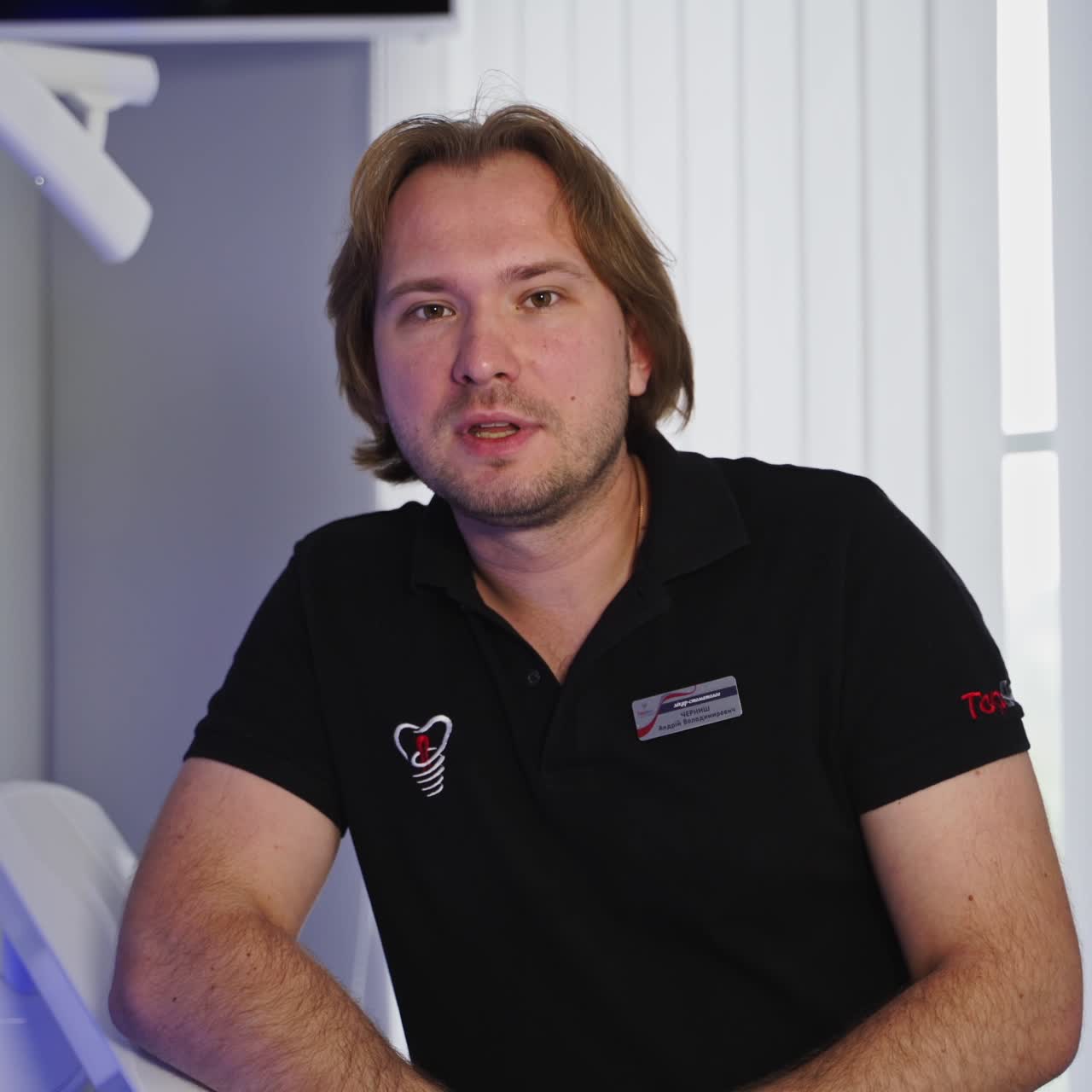 Dentist looking at camera