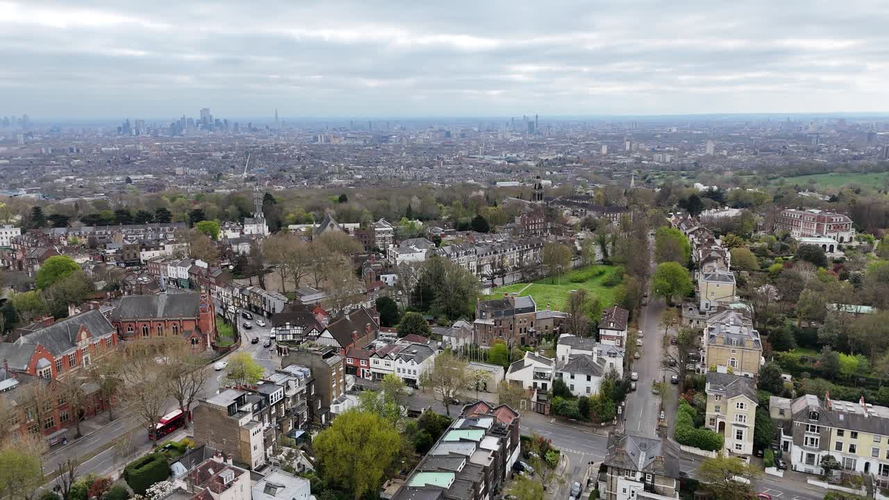 Highgate North London UK pull back drone aerial reverse reveal