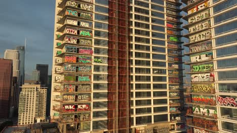 4K-Aerial-of-Graffiti-Tower-in-DTLA-in-February-2024,-Los-Angeles,-California,-USA