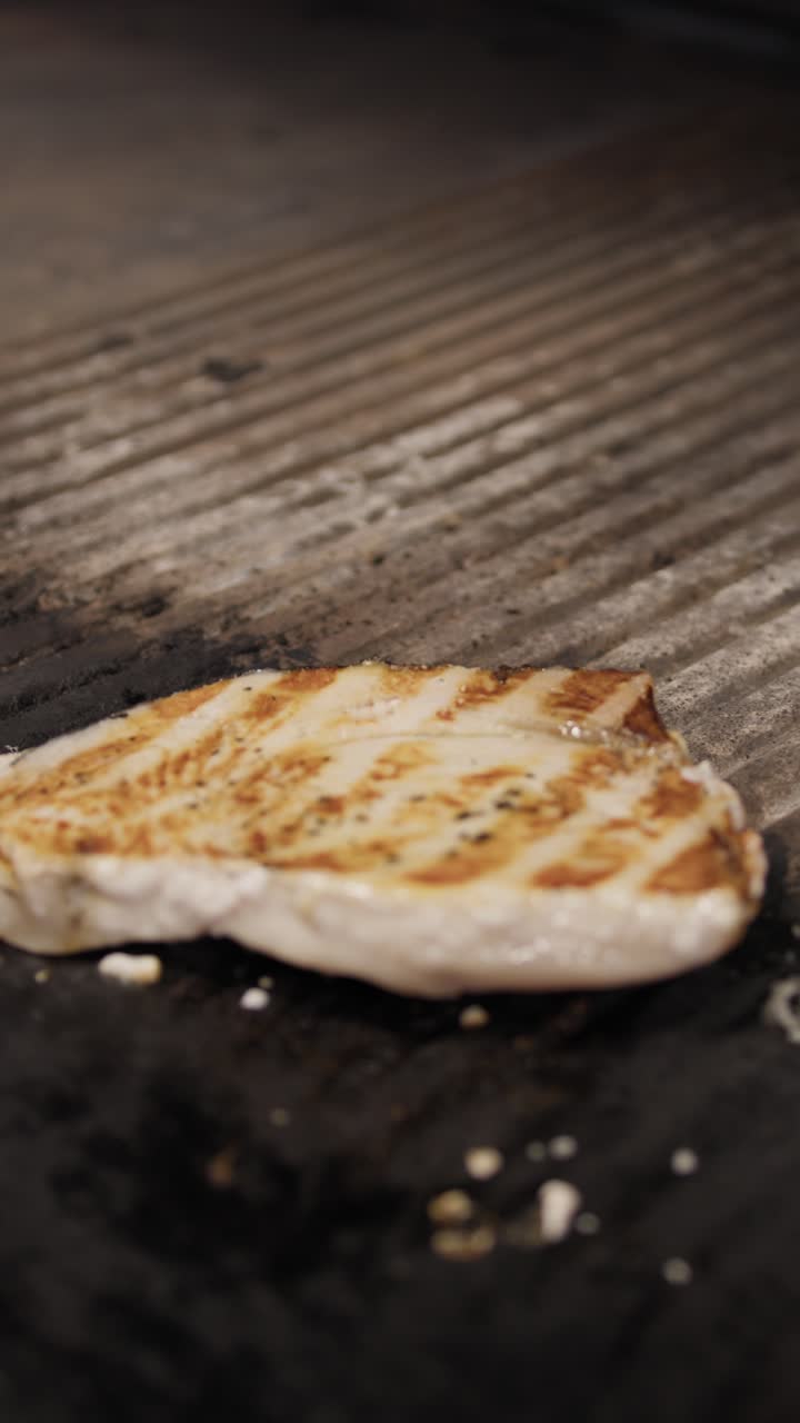 Chef Flipping The Swordfish Slice For Grilling