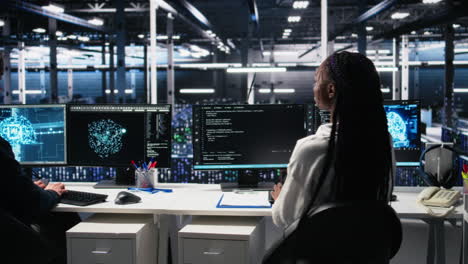 data center engineer using machine learning algorithms on green screen pc