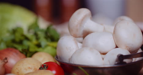 Fresh-Food-Ingredients-On-Wooden-Table-In-Kitchen-3