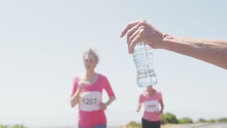 athletics women running on the road