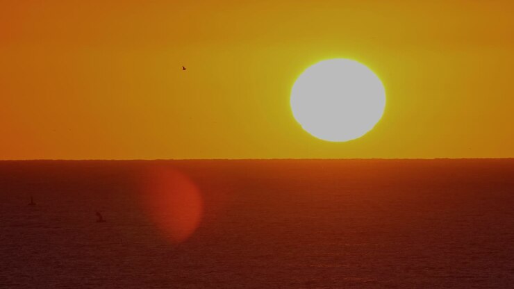 European sunset time with big sun and cloudless sky Cinematic 4k footage