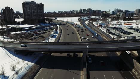 Drone-shot-cars-driving-on-highway-in-Ottawa