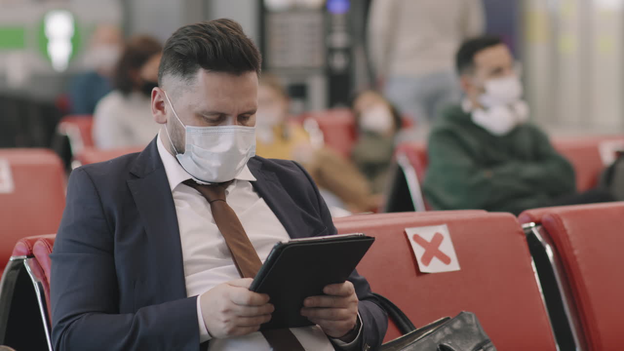 Business Man Waiting In Departure Lounge