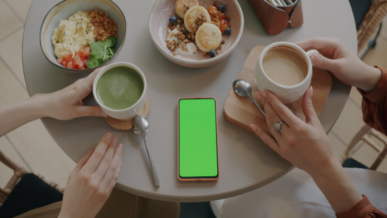 Friends enjoying breakfast in a cafe