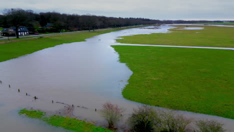 Pan-to-the-right-of-flooded-Limburg-landscape-in-the-Netherlands-in-the-winter-of-2024